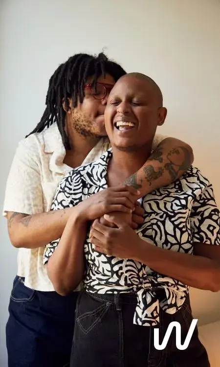 People embracing and smiling