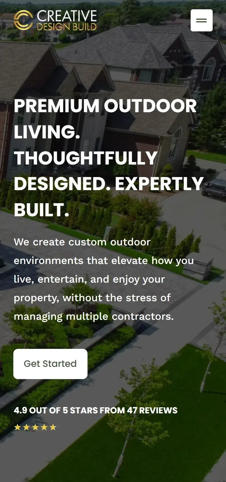 Creative Design Build homepage on a phone, with the same headline over the aerial photo, a white Get Started button and a 4.9 out of 5 stars rating